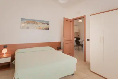 Letto o letti in una camera di ISA-Residence Le Fontane