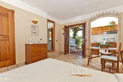 Letto o letti in una camera di Superb Residence Baia delle Palme Studio Mono