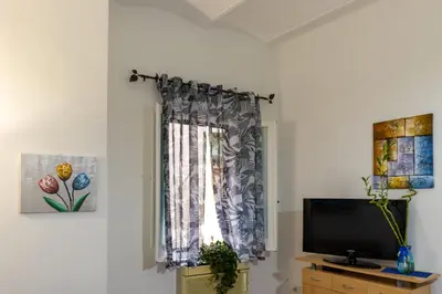TV o dispositivi per l'intrattenimento presso Casa Vacanza IgleHouse