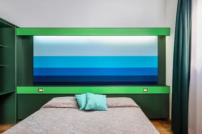 Letto o letti in una camera di Ecovillage with swimming-pool surrounded by greenery, apartments with air conditioning and outdoor private area