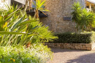 Giardino di Hotel with swimming-pool in Arborea just 600 meters from the sea