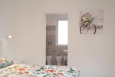Letto o letti in una camera di In centro storico Confort e charme !