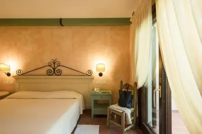 Letto o letti in una camera di Tranquil Lantana Resort Hotel Apartments 1 Bedroom room apartment sleeps 5 per