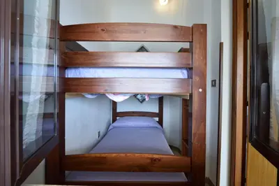 Letto o letti a castello in una camera di Appartamento Mariolu 1