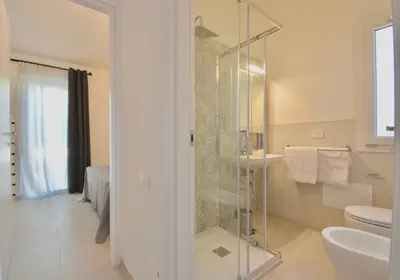 Bagno di Residence in Costa Rei just 450 meters from the beach, apartments with air conditioning and outdoor private area