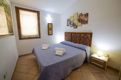 Letto o letti in una camera di Trilocale Apartments Seaside