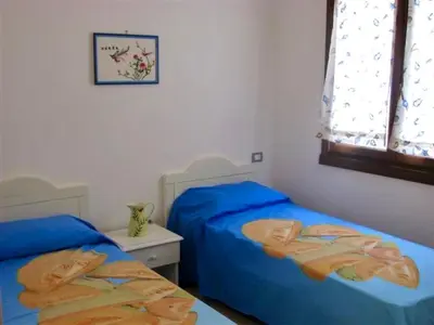 Letto o letti in una camera di Villas with shared pool in Costa Rei just 500 meters from the sea