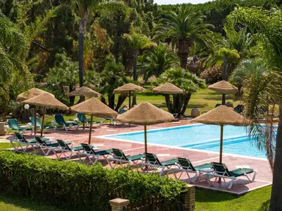 Piscina di Tropical Residence In Santa Margherita Di Pula o nelle vicinanze