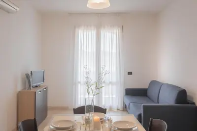 Area soggiorno di Stylish Residence Le Fontane 1 BedrApt B4 sleeps 4