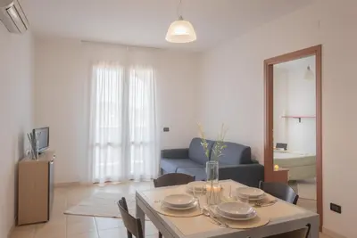 Area soggiorno di Stylish Residence Le Fontane 1 BedrApt B4 sleeps 4