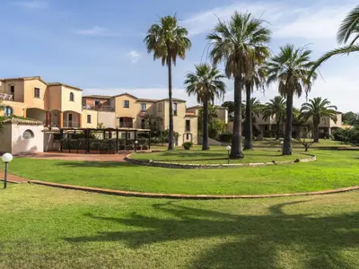 Giardino di Apartment Baia delle Palme-1 by Interhome