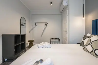Letto o letti in una camera di Saint Margaret Apartments - Magnolia