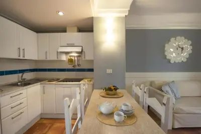 Cucina o angolo cottura di Sardinian-style Resort 2 Bedroom Apartments Sleeps 7