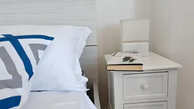 Letto o letti in una camera di Blu Mare