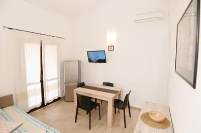 TV o dispositivi per l'intrattenimento presso AmareSardegna11 con giardino