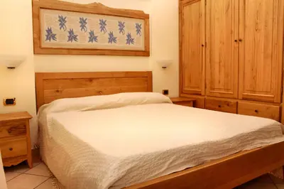 Letto o letti in una camera di Antica Palazzina Lamarmora 2