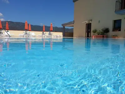 Piscina di Stylish Residence Le Fontane 2 BedrApt T5 sleeps 5 o nelle vicinanze