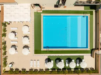 Piscina di Stylish Residence Le Fontane 2 BedrApt T5 sleeps 5 o nelle vicinanze