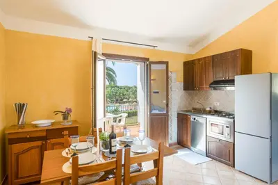 Cucina o angolo cottura di Baia delle Palme 4 people Apartment Premium
