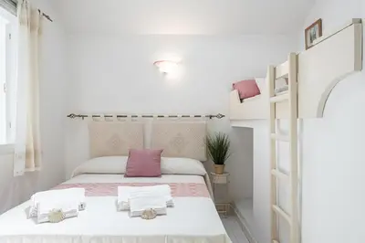 Letto o letti in una camera di Carloforte - Jewel on the seafront promenade