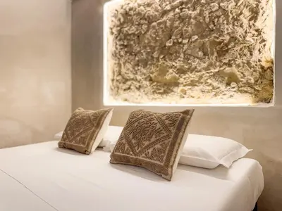 Letto o letti in una camera di Kalma Elephant Tower Guardians House - Historic Stay at Old Town