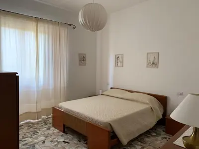 Letto o letti in una camera di Arega Rooms