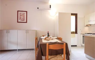 Cucina o angolo cottura di Lovely Apartment In Costa Rei -Ca-