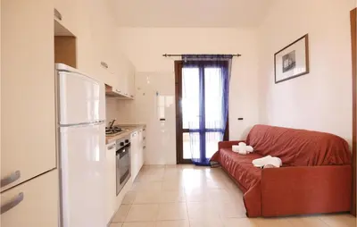 Cucina o angolo cottura di Awesome Apartment In Costa Rei -Ca-