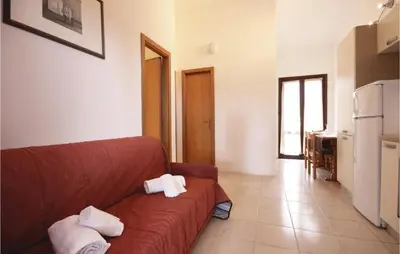 Cucina o angolo cottura di Awesome Apartment In Costa Rei -Ca-