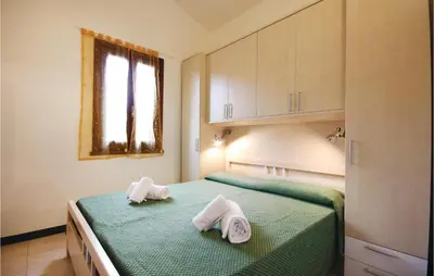 Letto o letti in una camera di Awesome Apartment In Costa Rei -Ca-