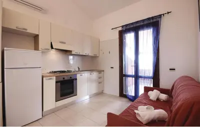 Cucina o angolo cottura di Gorgeous Apartment In Costa Rei -Ca-