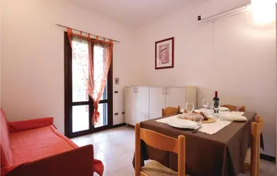 Area soggiorno di Gorgeous Apartment In Costa Rei -Ca-