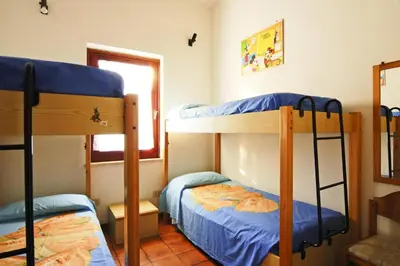 Letto o letti in una camera di Apartment in Costa Rei by Turquoise Beaches