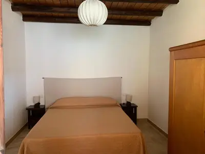 Letto o letti in una camera di Arega B&B