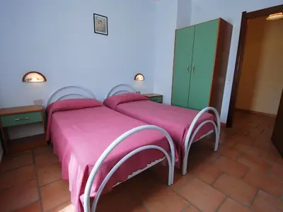 Letto o letti in una camera di Apartment Is Murtas-3 by Interhome