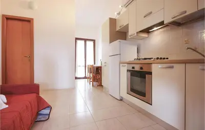Cucina o angolo cottura di Beautiful Apartment In Costa Rei -Ca-