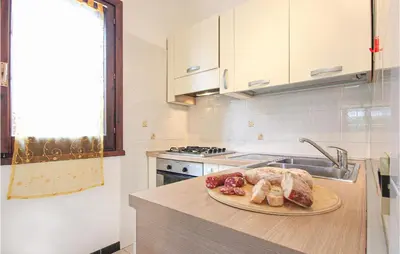Cucina o angolo cottura di Stunning Apartment In Costa Rei -Ca-