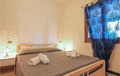 Letto o letti in una camera di Stunning Apartment In Costa Rei -Ca-