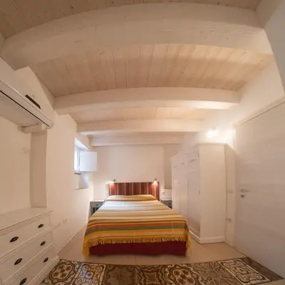 Letto o letti in una camera di L'Approdo Bilocale