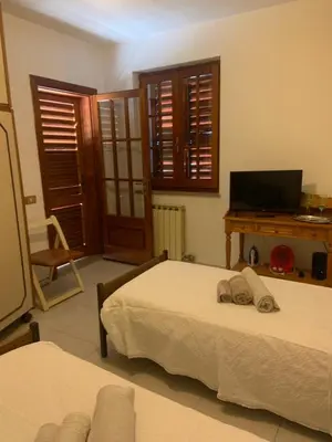 Letto o letti in una camera di Il Salvatore