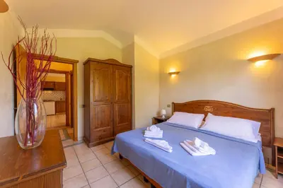 Letto o letti in una camera di Baia delle Palme residence