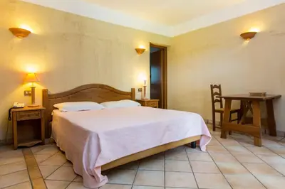 Letto o letti in una camera di Residence Baia delle Palme Studio 43439